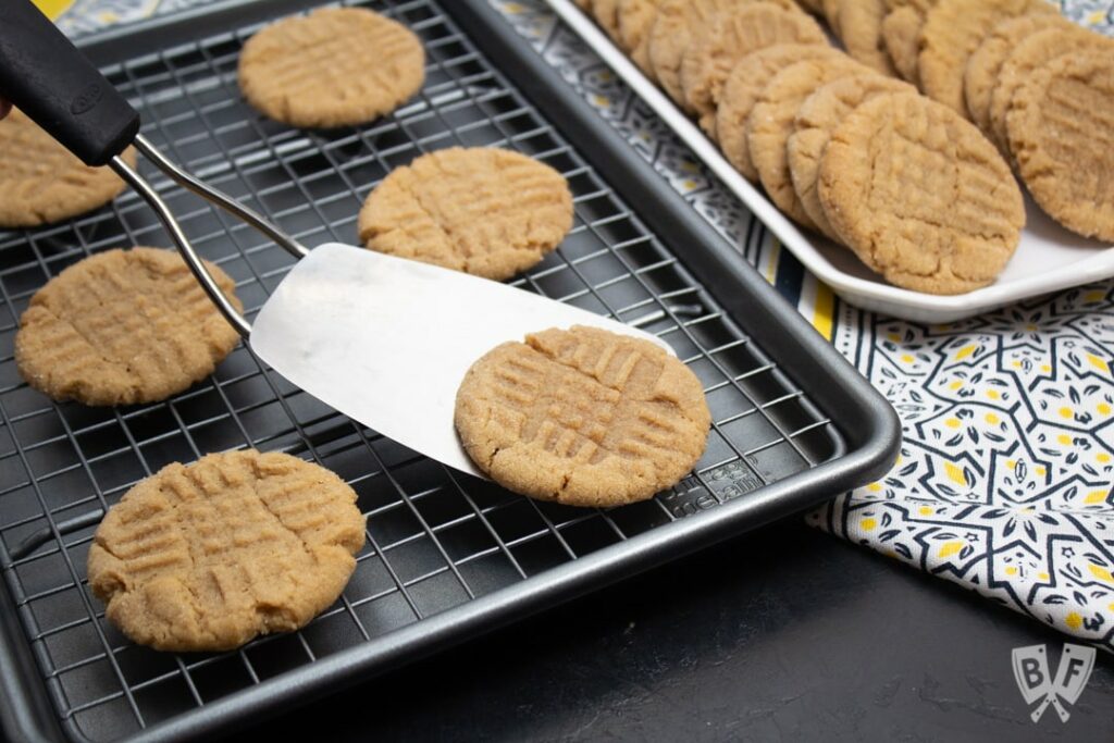 Peanut butter cookies on cooling rack.